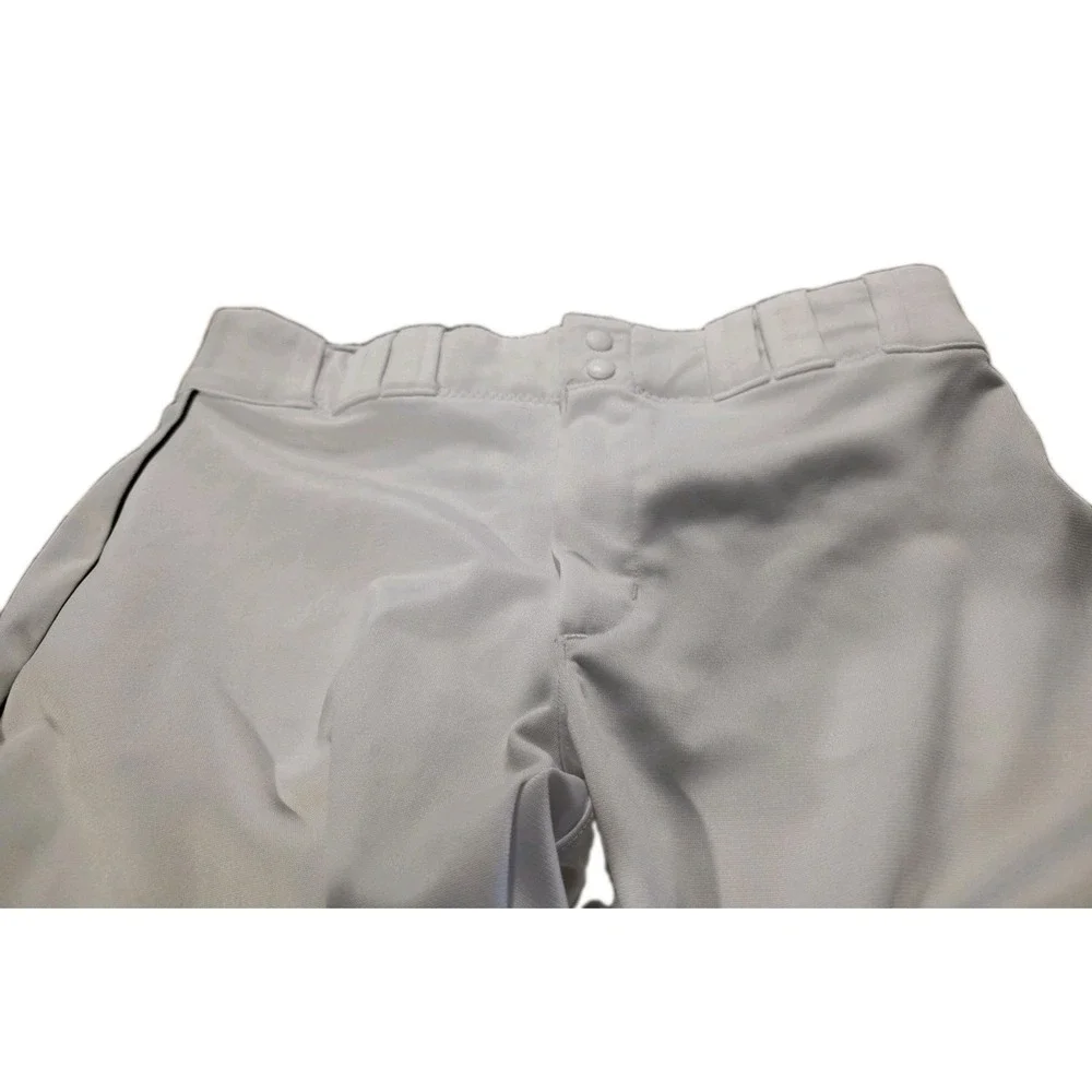 Under Armour branded inner waistband, tunnel belt loops, double snap closure. LG